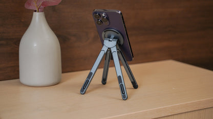 Foldnix magnetic phone stand with iPhone on desk